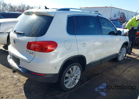2014 Volkswagen Tiguan Sel from USA, damaged, VIN WVGBV3AX5EW535459